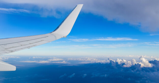 ein Bild aus dem Flugzeug als Symbol für Ferne und Ausland